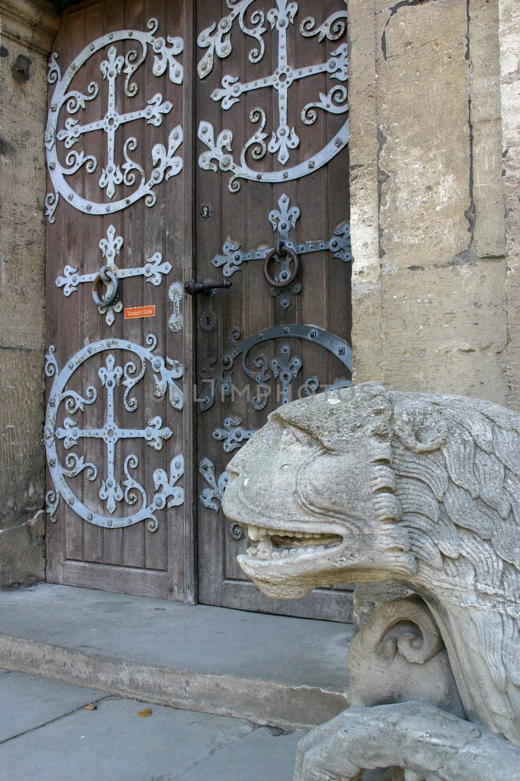 Lion sculpture next to the main entrance to the Imperial Cathedral in Königslutter