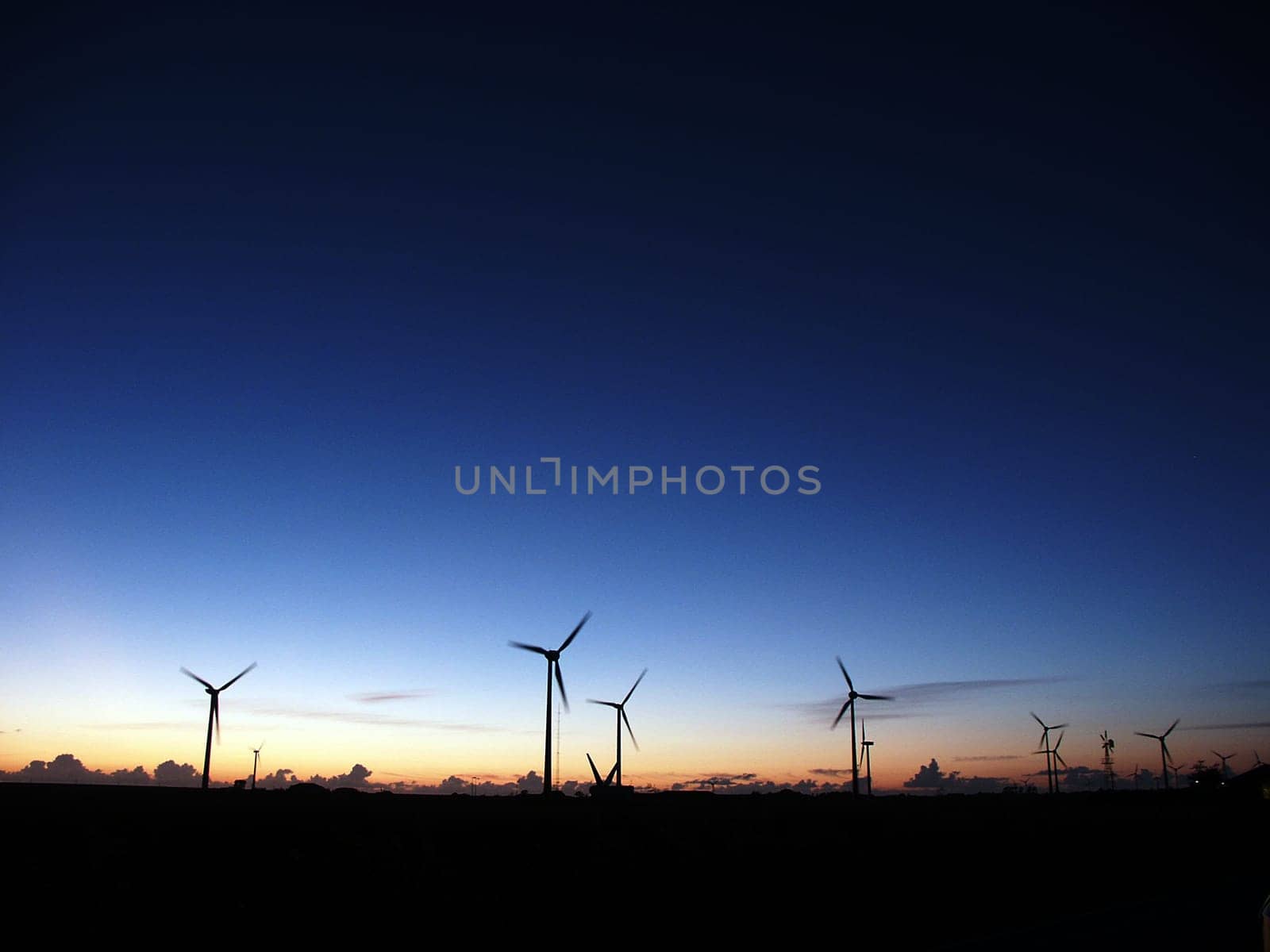 Wind turbines at sunset