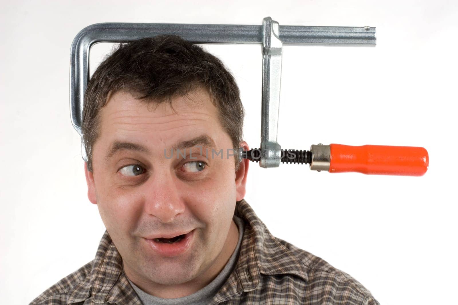 Man whose head is fixed with a screw clamp