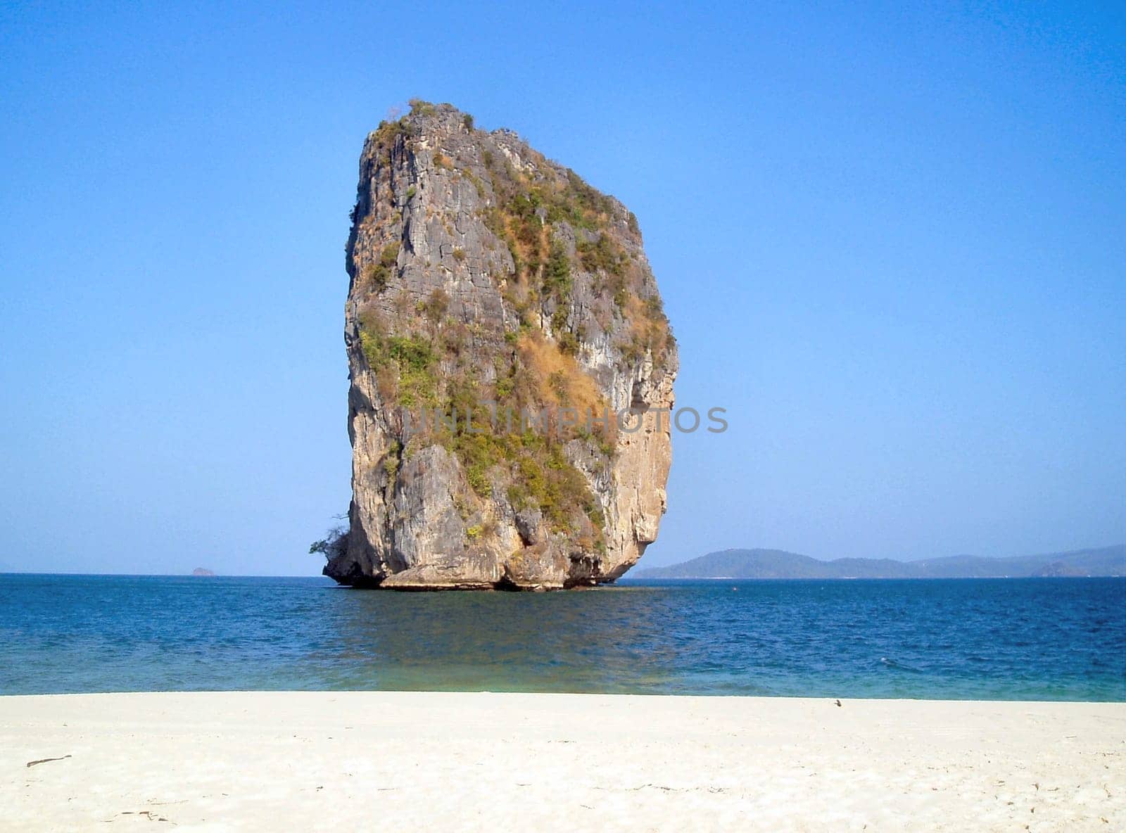 Poda Island is an island near Krabi. In contrast to Pra Nang Bay,it is quite secluded and with far fewer tourists. We had the beach almost to ourselves when we arrived.....