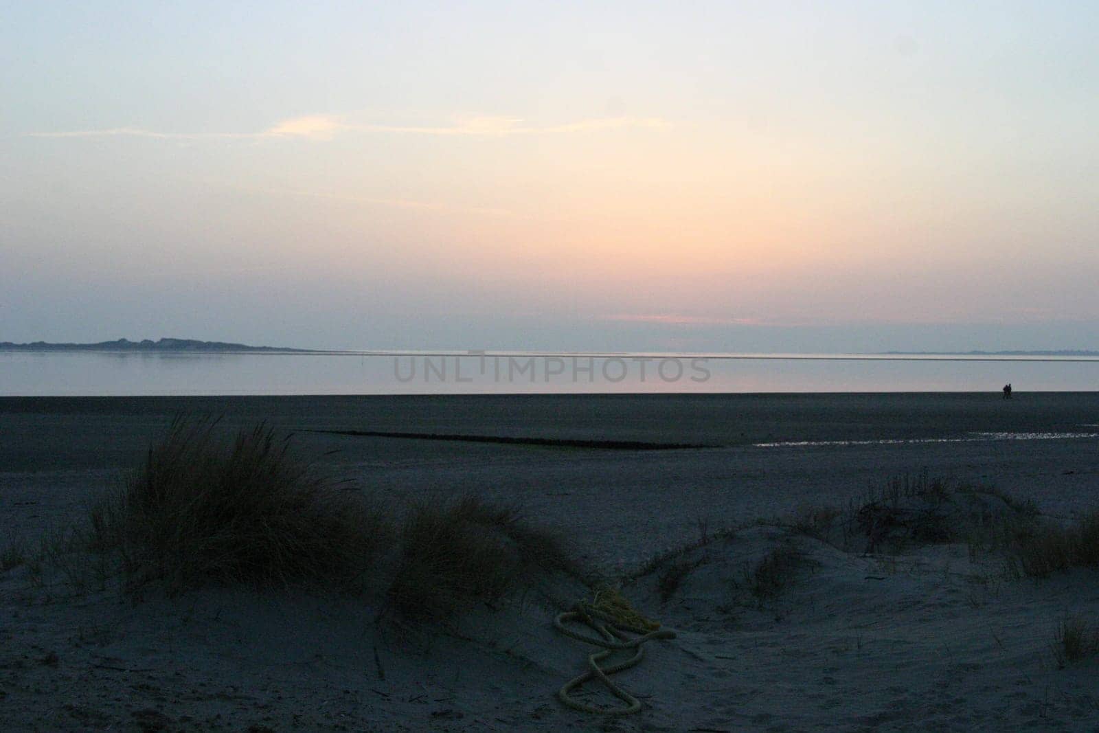 In the evening at low tide on the beach on the island of Föhr.