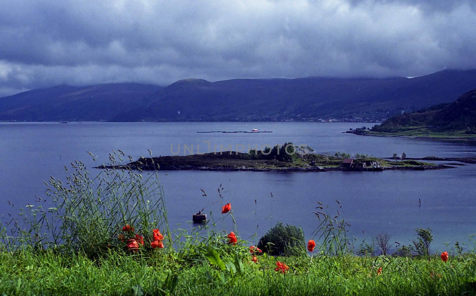 Scan of the negative Norway June 2005....  Yes,this photo is now almost exactly one year old and the weather went crazy in Norway last year! The whole holiday was very rainy and such a cloud picture was not uncommon. But the S