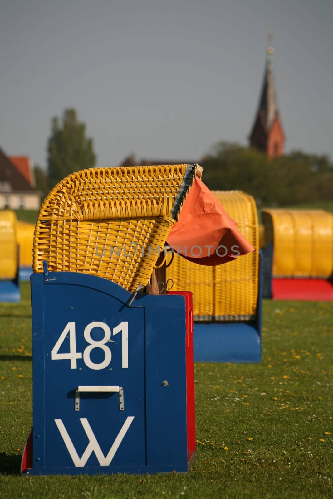 Beach chair on the green beach of Cuxhaven-Grimmershörn