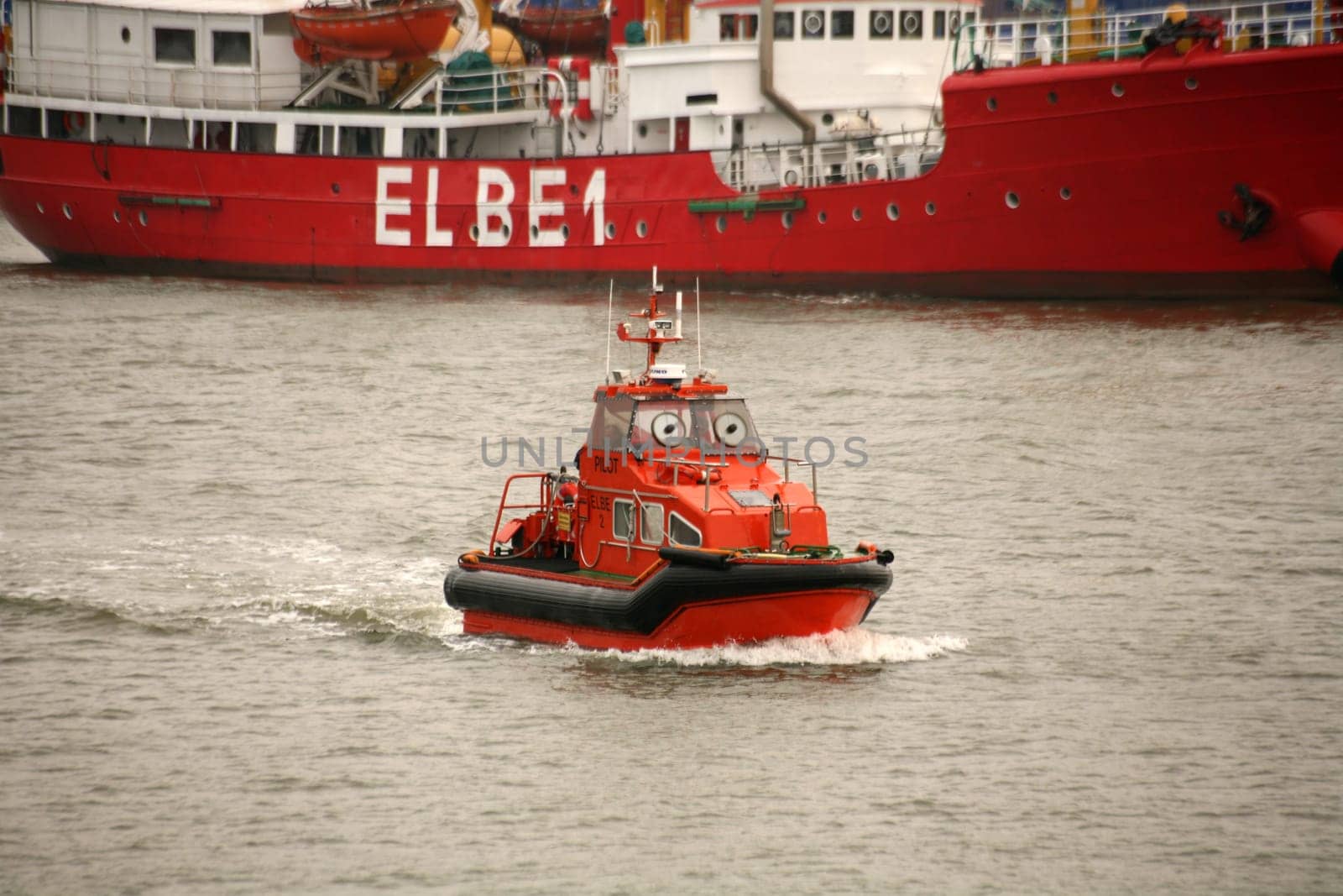 Feeder boat of the Elbe pilots in front of the lightship Elbe 1