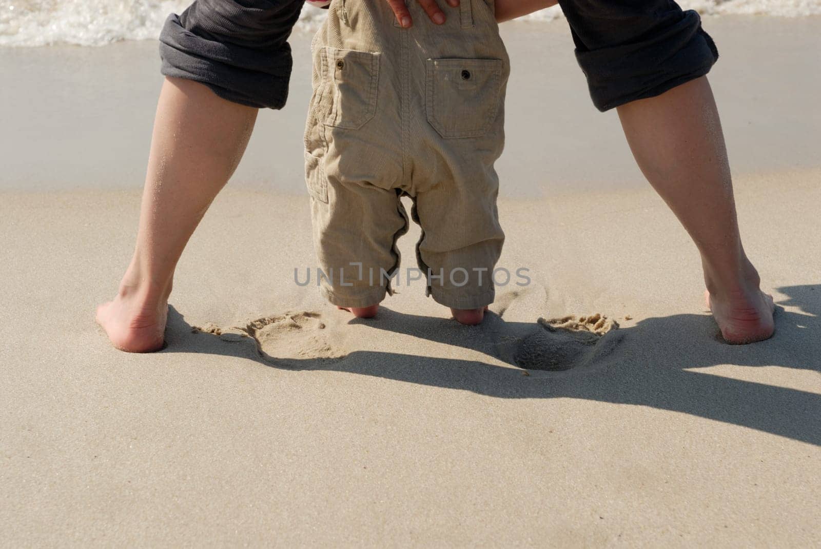 Mother and daughter on the beach