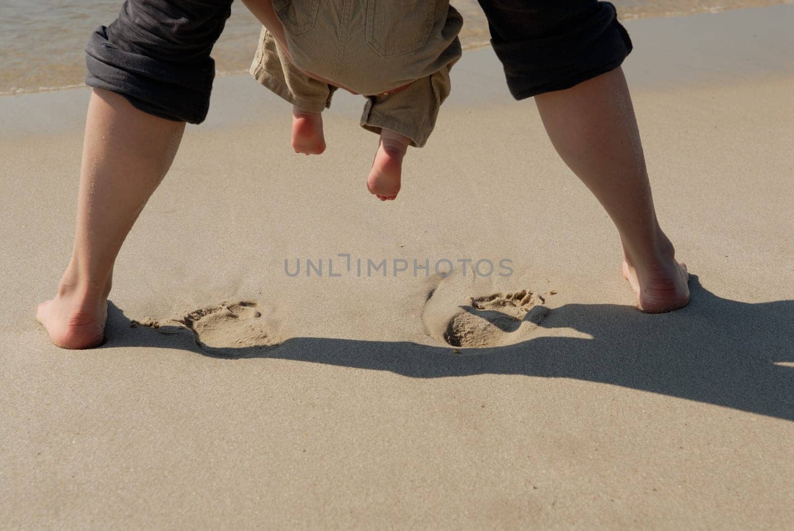 Mother and daughter on the beach
