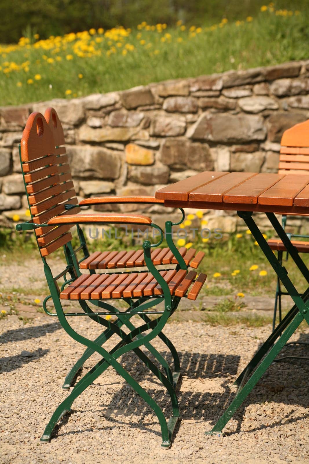 Table and chairs in a garden restaurant