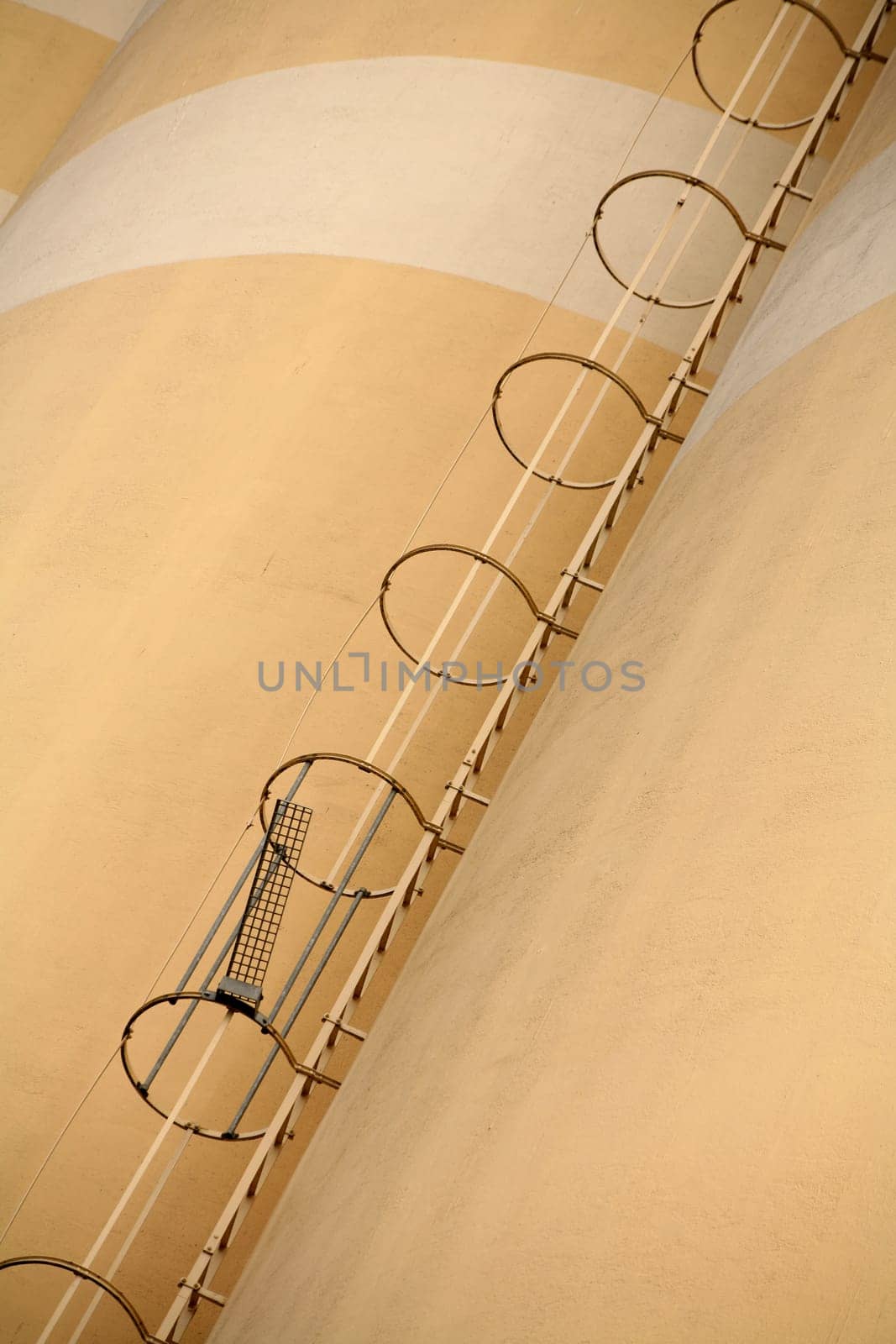 Metal stairs on a very high grain silo