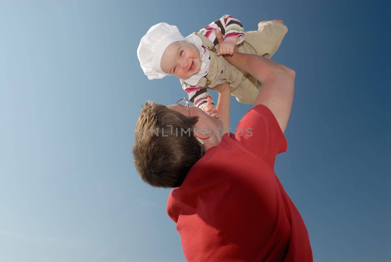 Mother with laughing child in her arms