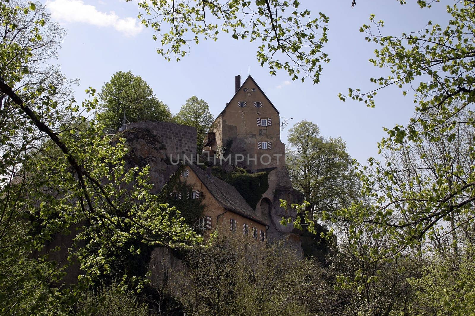 Pottenstein Castle rises on a rock above the town of the same name in Bavaria.  The castle was founded in the 11th century and originally served to secure the area between the Upper Main and Pegnitz to the southeast. After almost 800 years