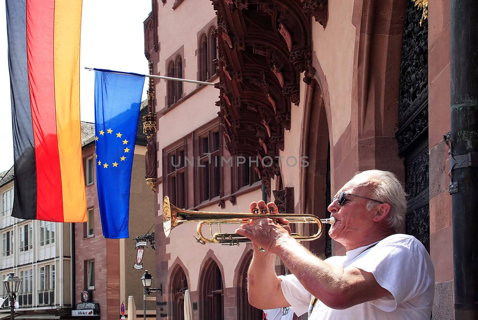 This man is already a landmark of Frankfurt. He gave me copies of newspaper articles about him - a passionate trumpeter for 35 years.