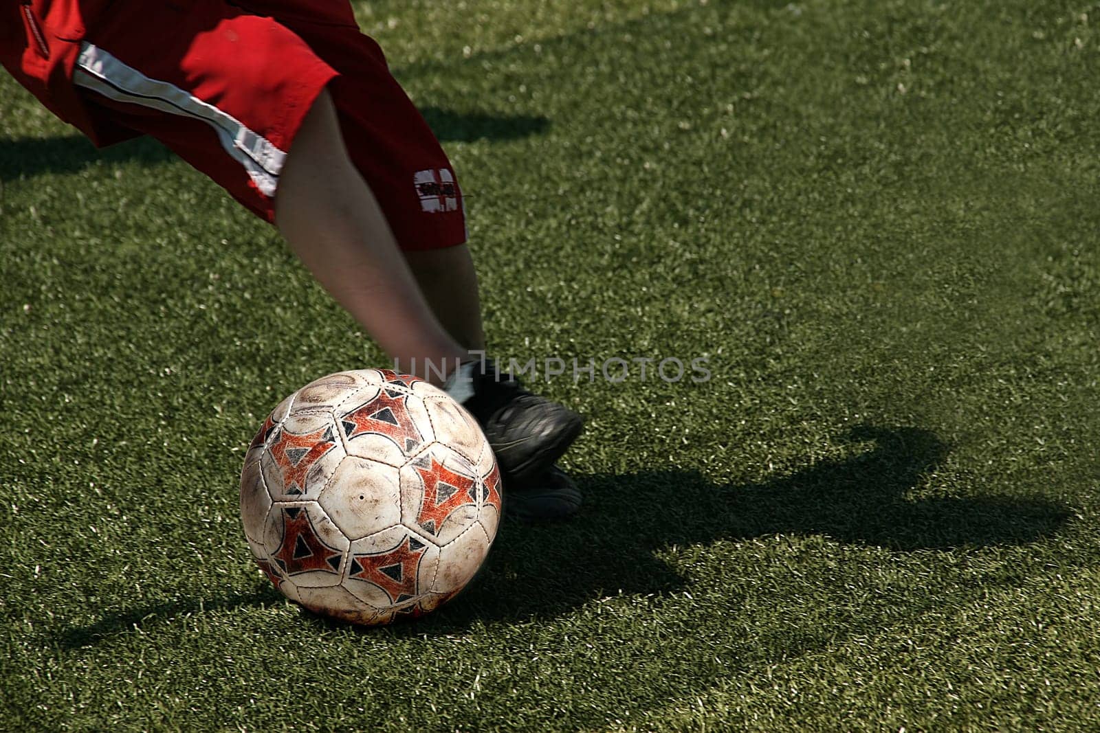 Soccer kicker in red