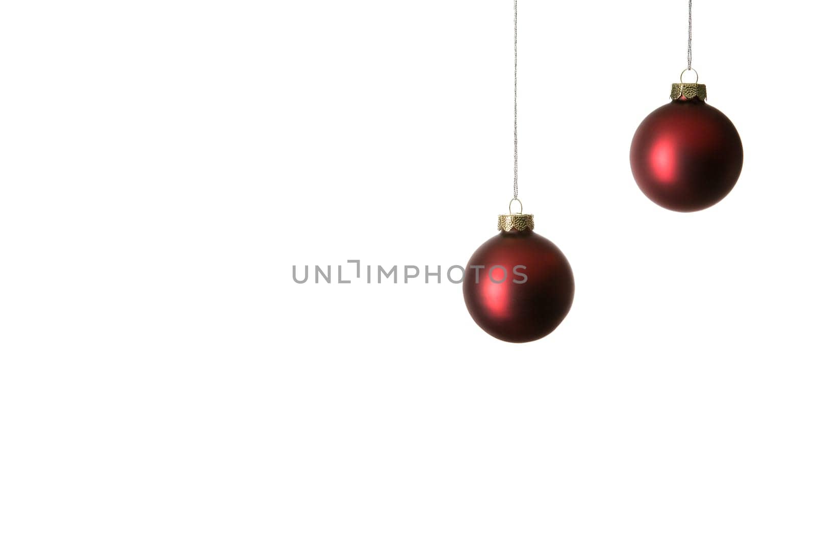 Two red Christmas tree baubles,cropped