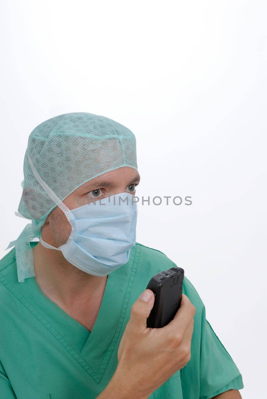 Doctor during examination with voice recorder
