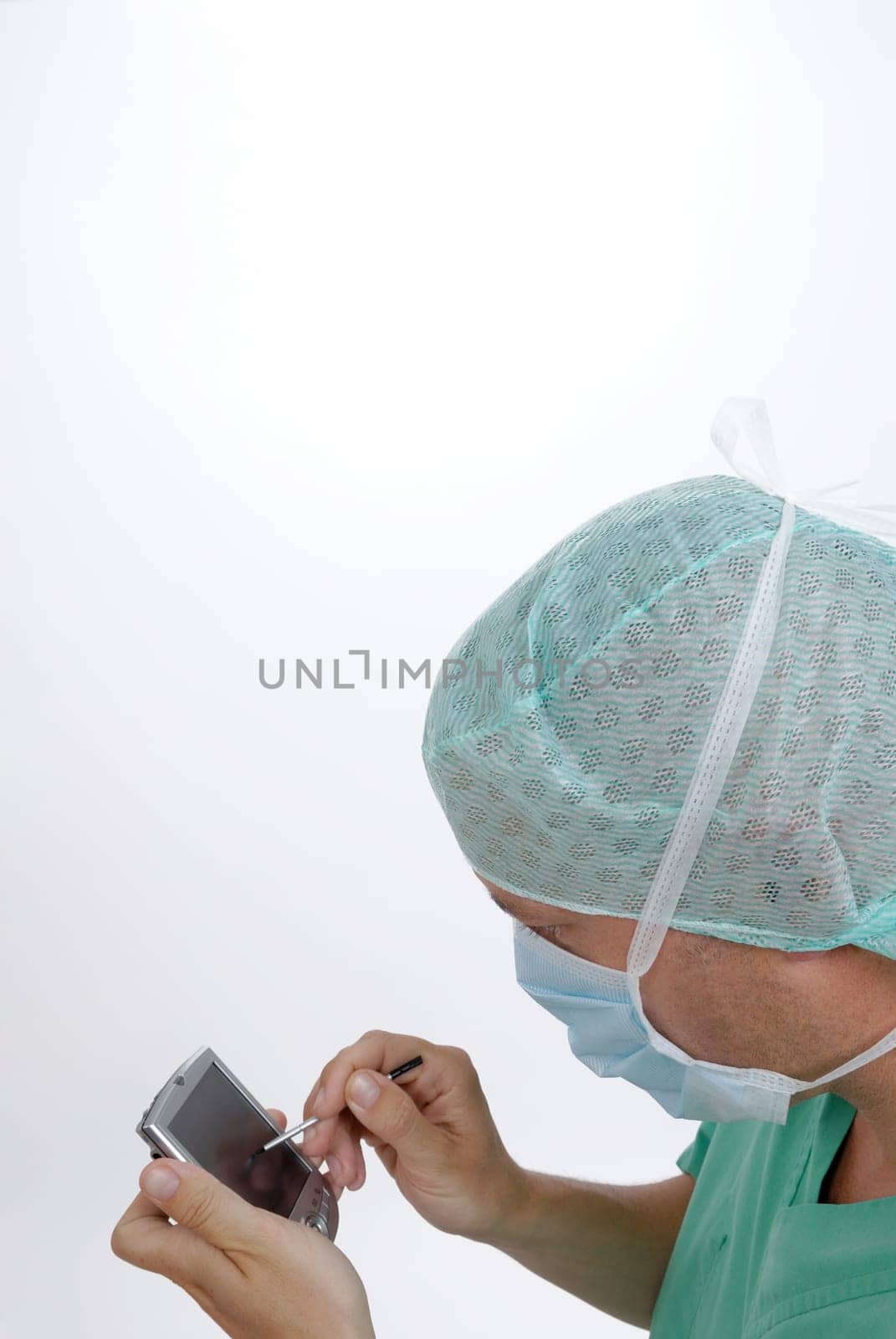 Doctor enters data into a PDA