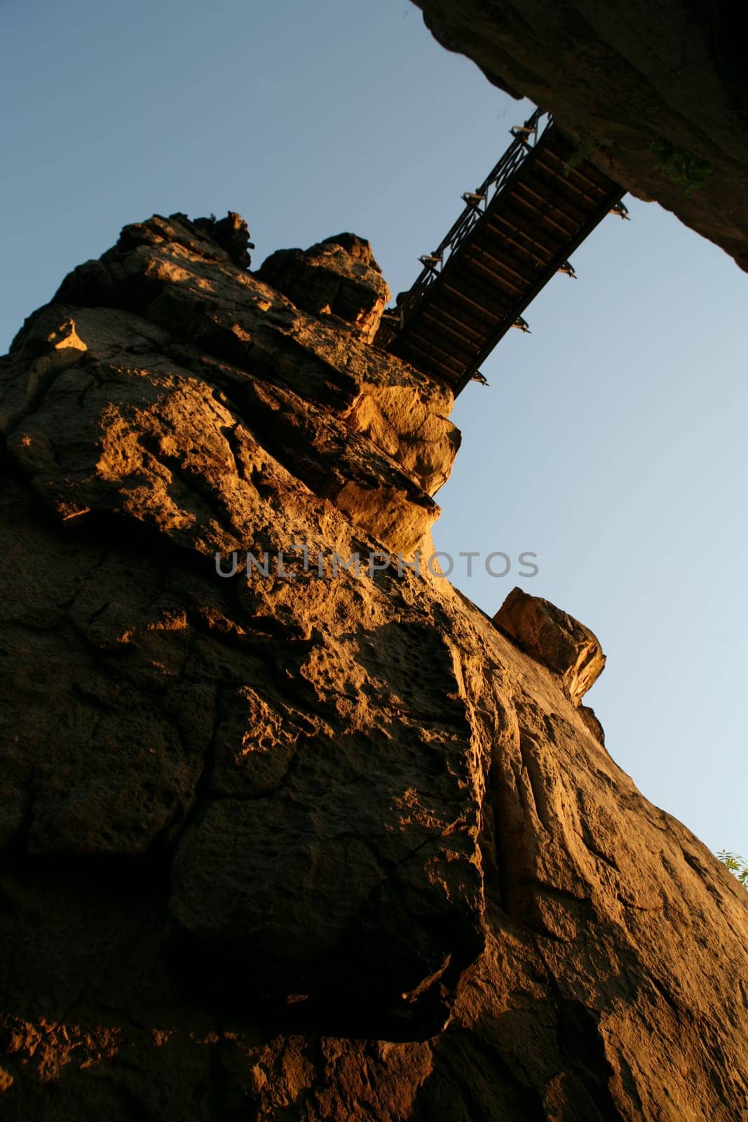 The imposing rocks of the Externsteine in Lipperland. View of the bridge between rocks 2 and 3 from below.