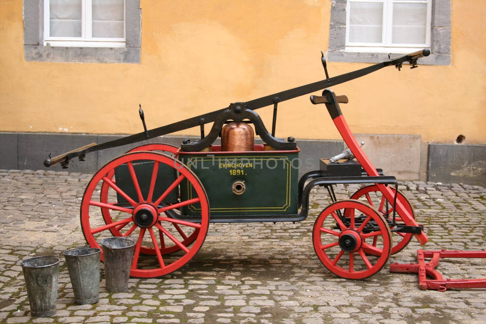 Hand-held fire engine of the volunteer fire brigade of Evinghoven from 1891
