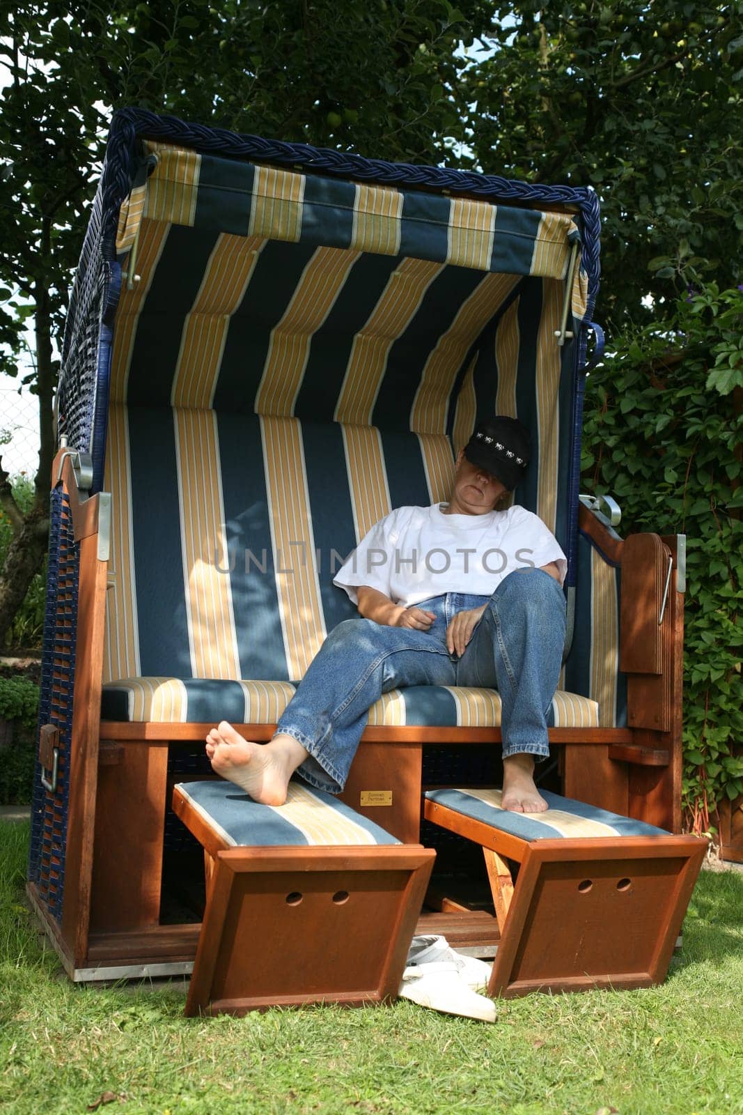 Relax in a beach chair in the garden