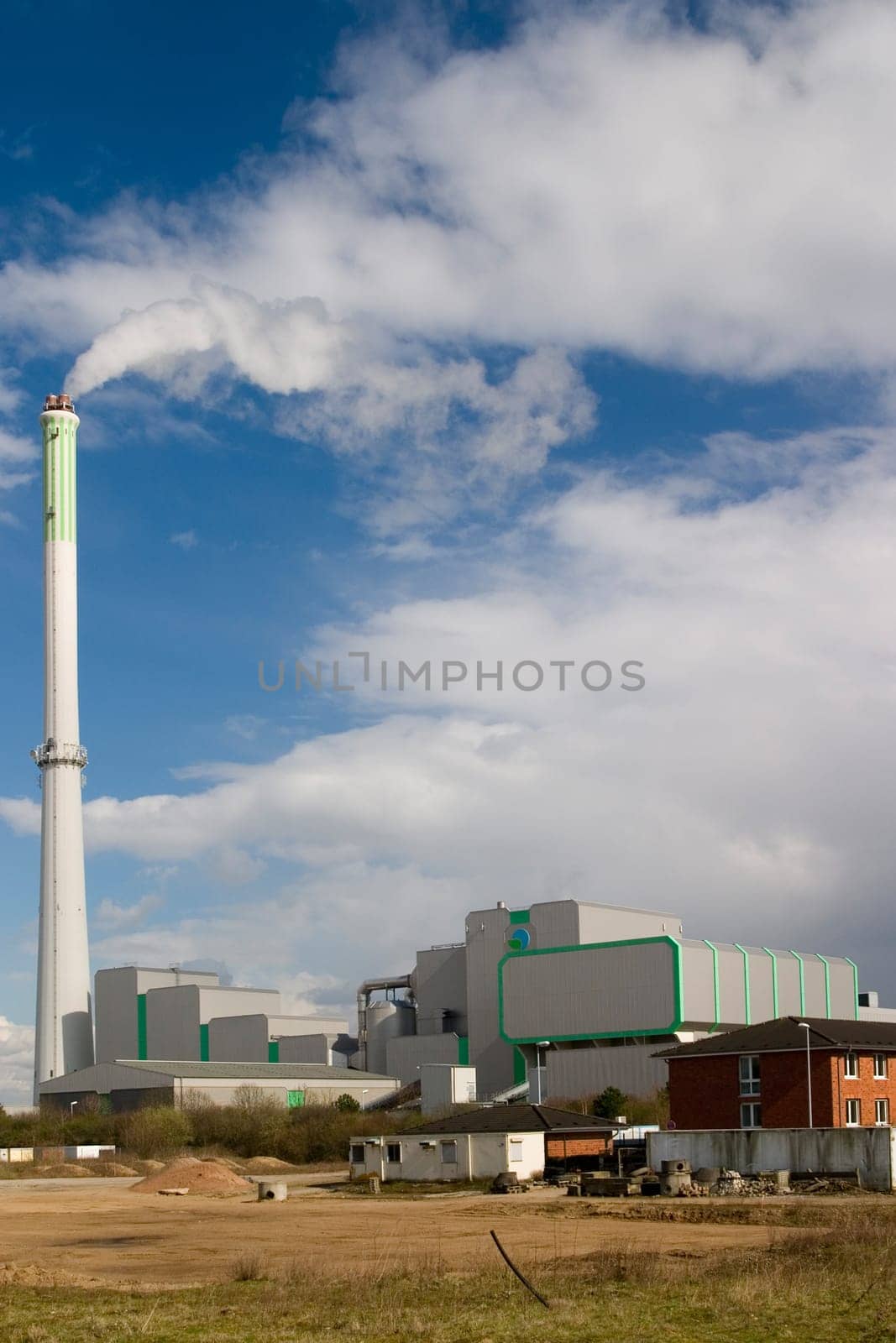 Power plant in front of a blue sky