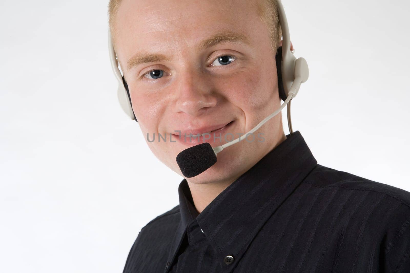 A young sympathetic man with a headset