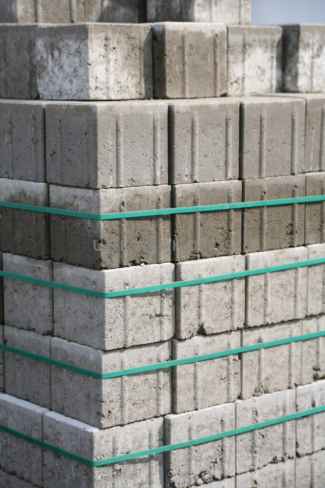 Bundled paving stones at a construction site