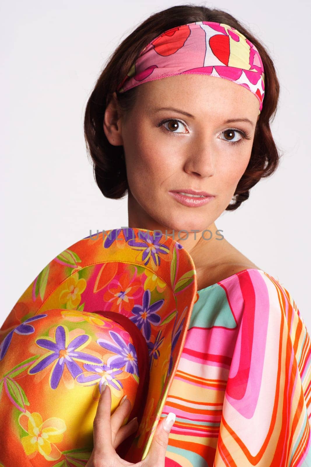A woman in the colorful clothes of the seventies