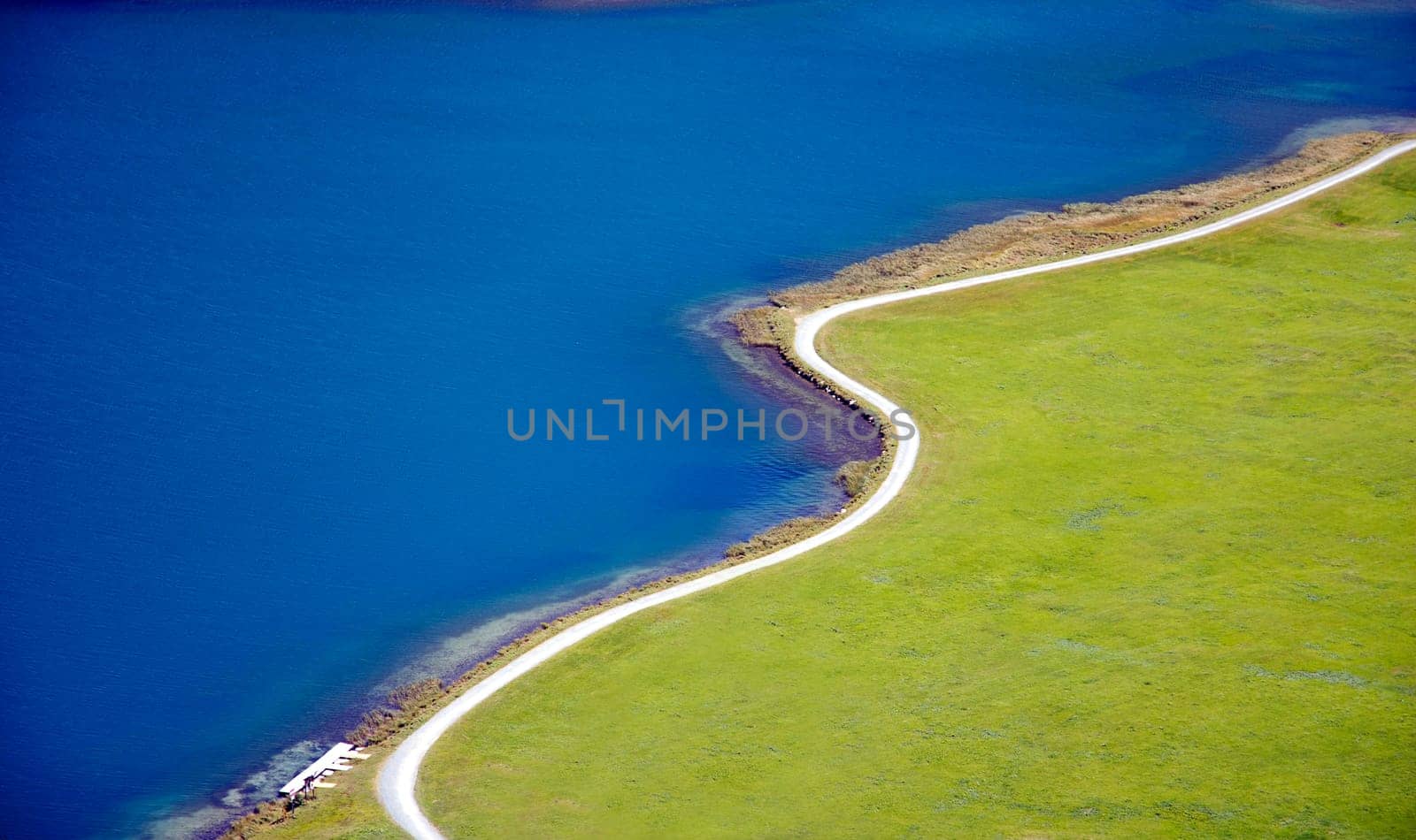 Walk along Lake Silvaplana in the Upper Engadine