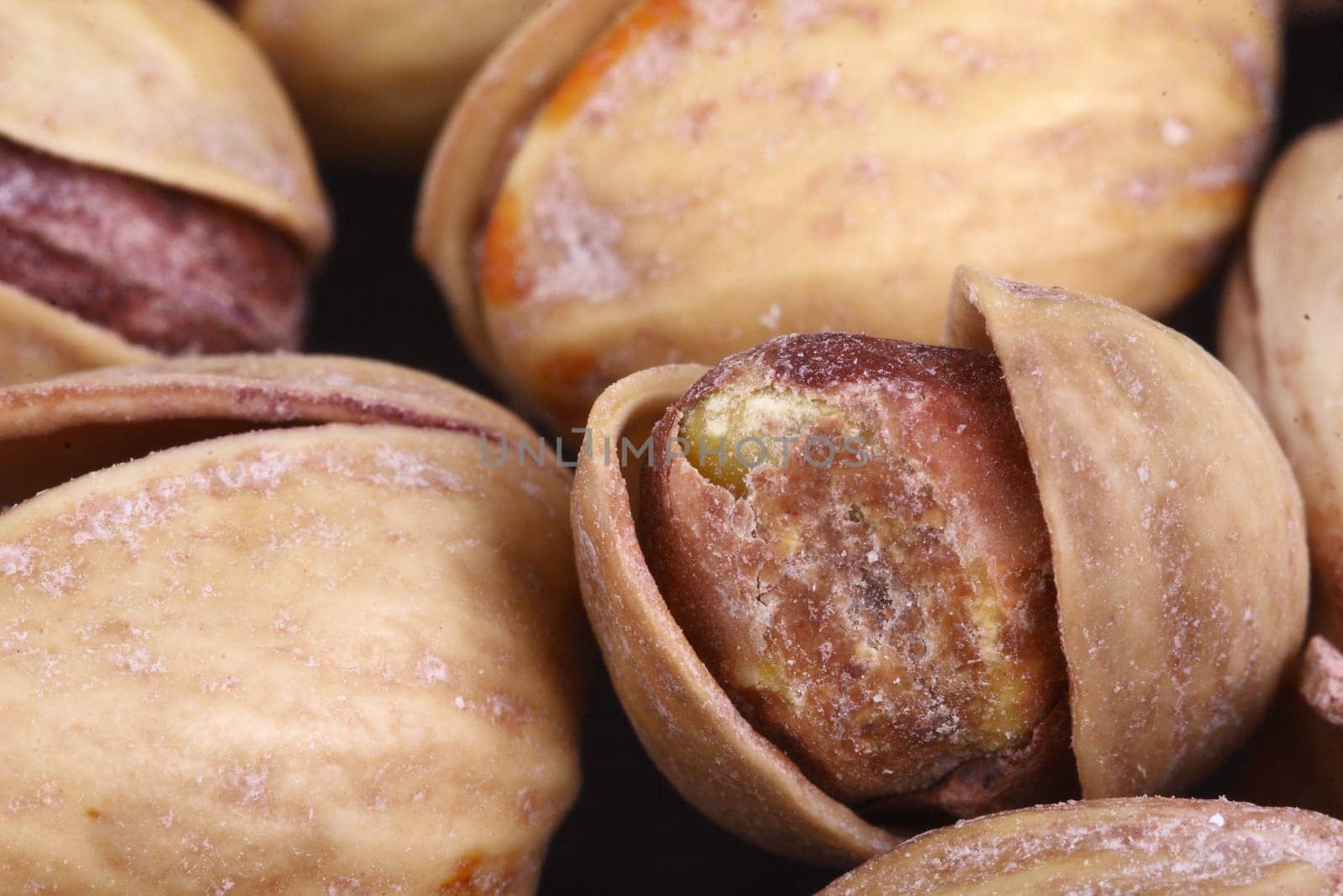 Salted pistachios in shell and loose