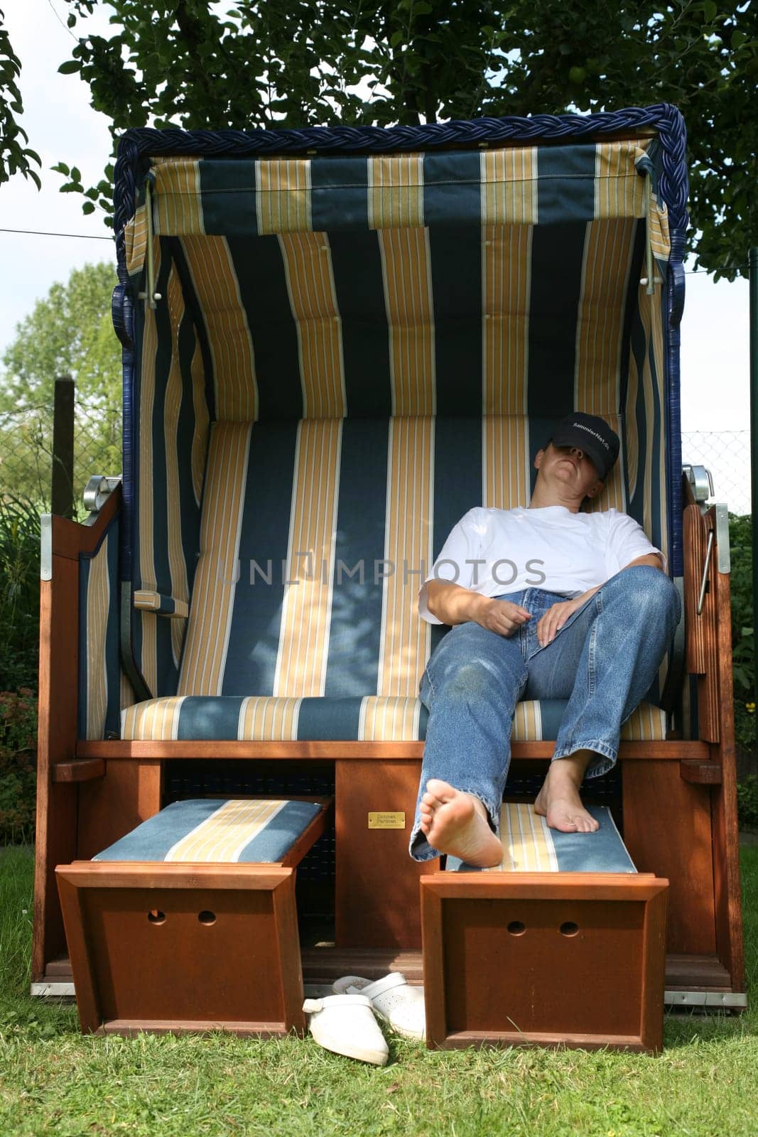 Relax in a beach chair in the garden