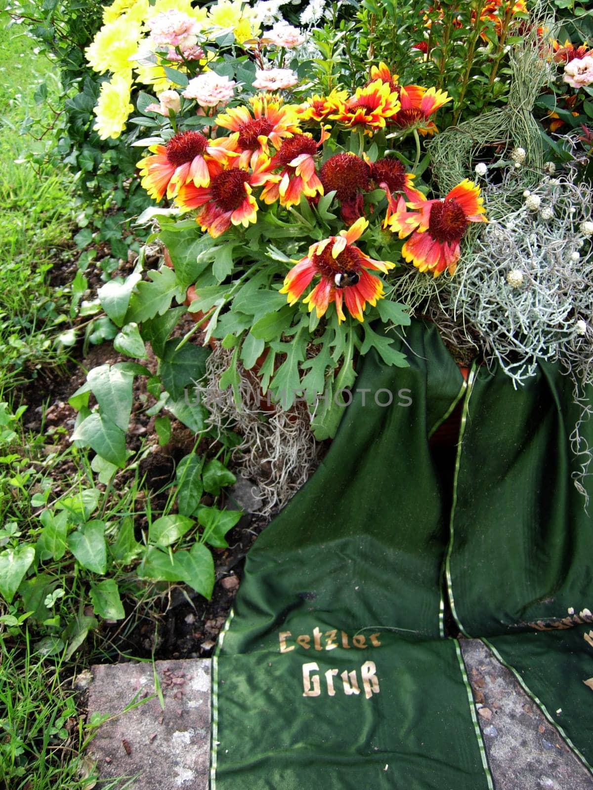 Flowers and wreaths on a grave