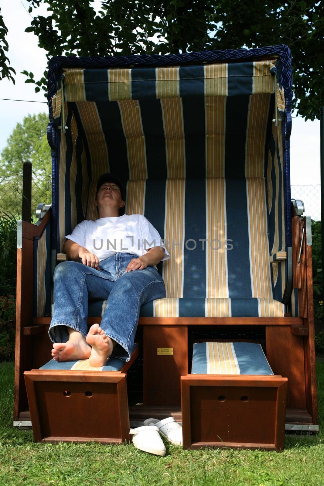 Relax in a beach chair in the garden