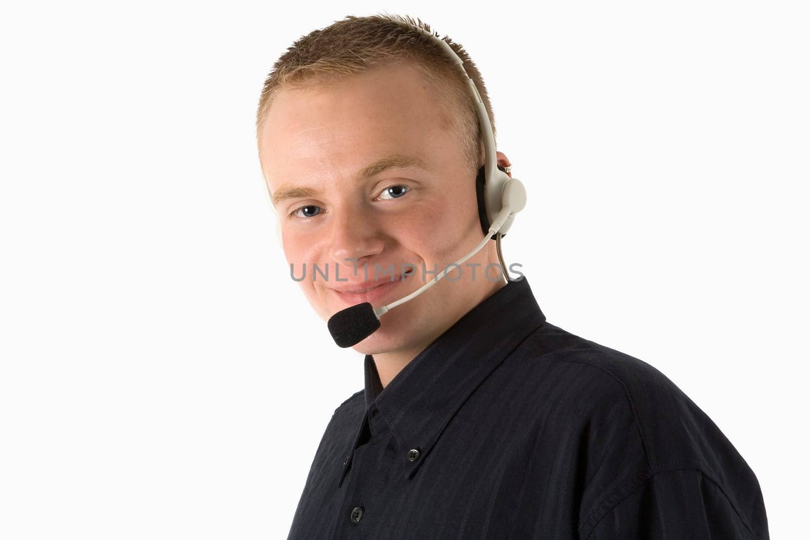 A young sympathetic man with a headset