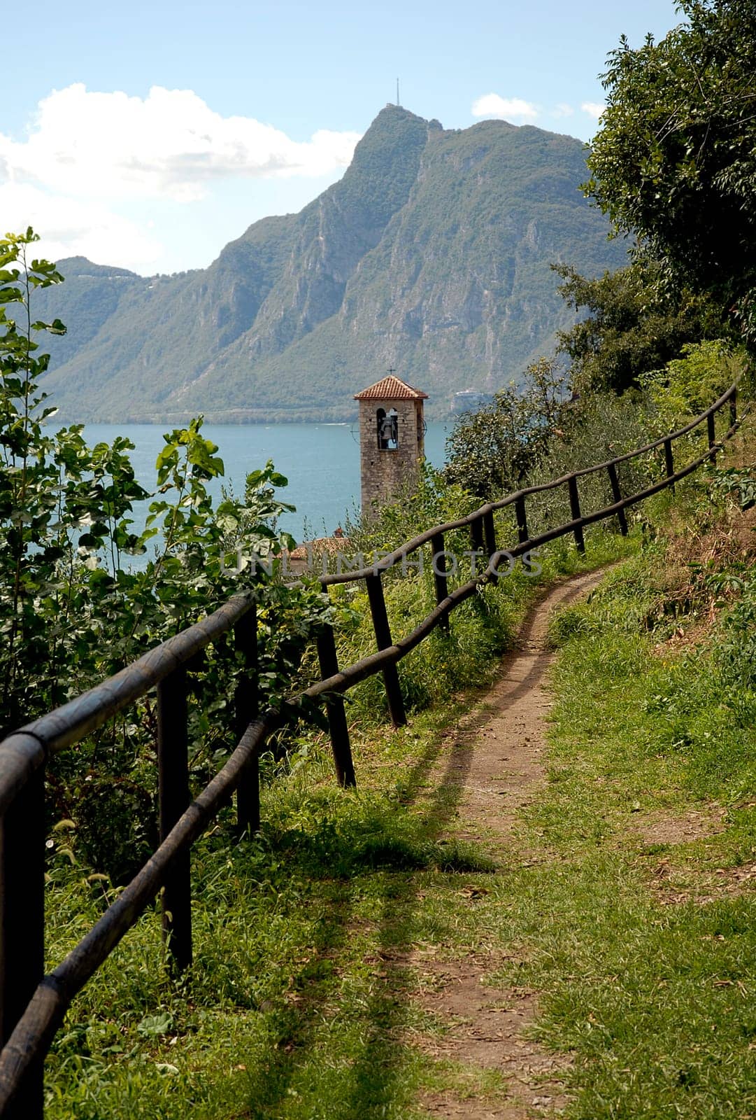 From Lugano,a beautiful walking or hiking trail leads along the shores of Lake Lugano through olive groves to Gandria.