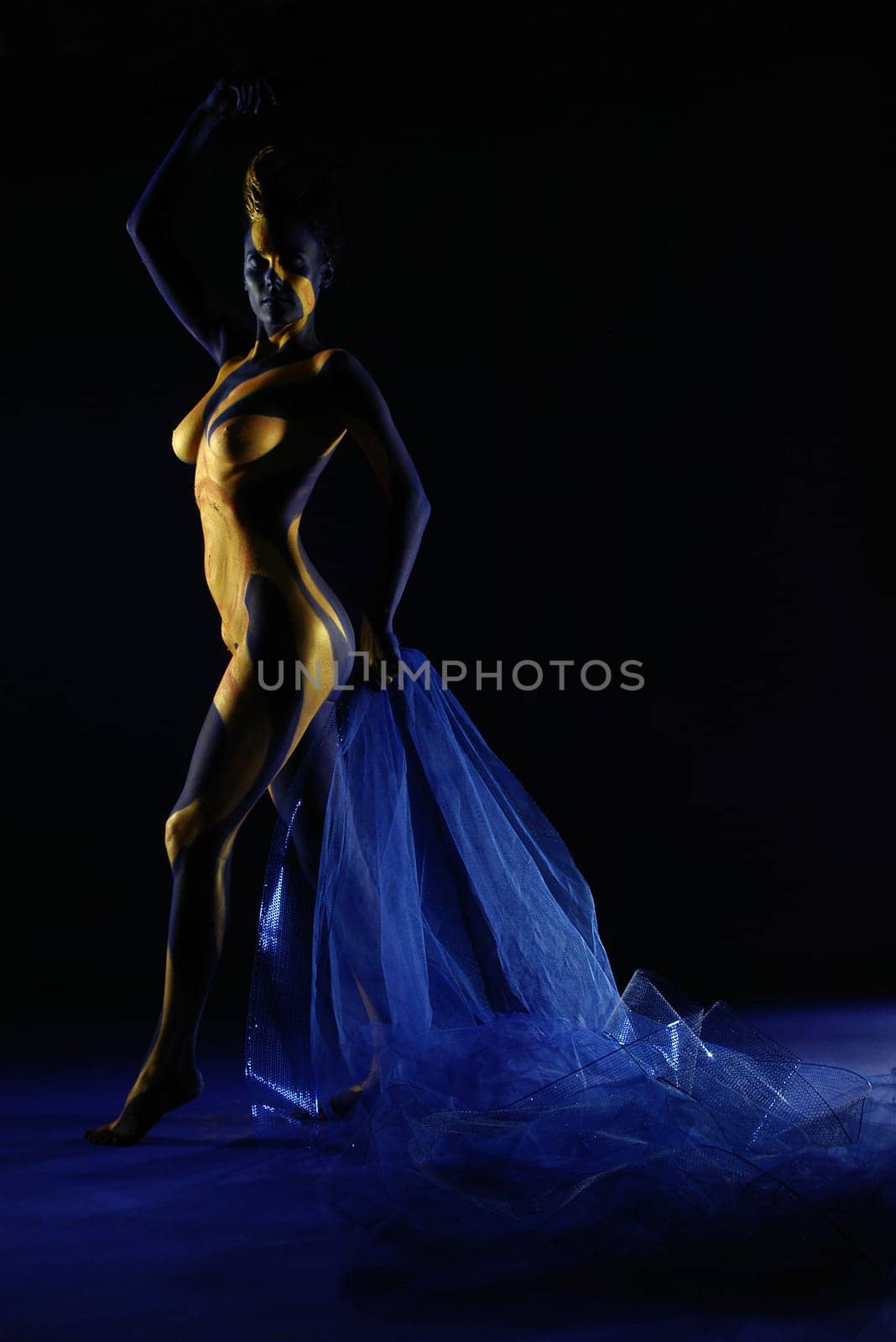 Woman,Bodypainting,Painted,Blue,Yellow,Gold,Sun,Ray,Rays,Body,Nude,Nude,Breast,Body Painting,Painted,Color,Torso,Sculpture,Statue,Art,Calendar,Static,Abstract,Figure