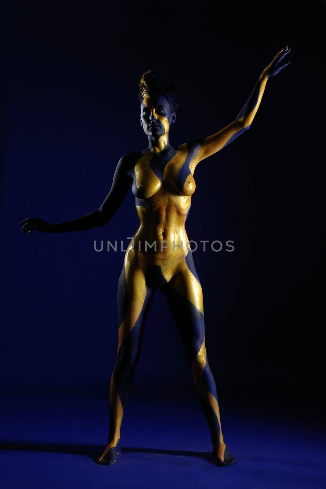 Woman,Bodypainting,Painted,Blue,Yellow,Gold,Sun,Ray,Rays,Body,Nude,Nude,Chest,Body Painting,Painted,Color,Torso,Sculpture,Statue,Art,Calendar,Static,Abstract,Figure,Shine