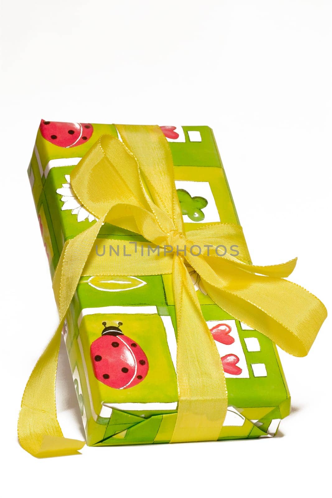 Gift wrapped with bow on white background