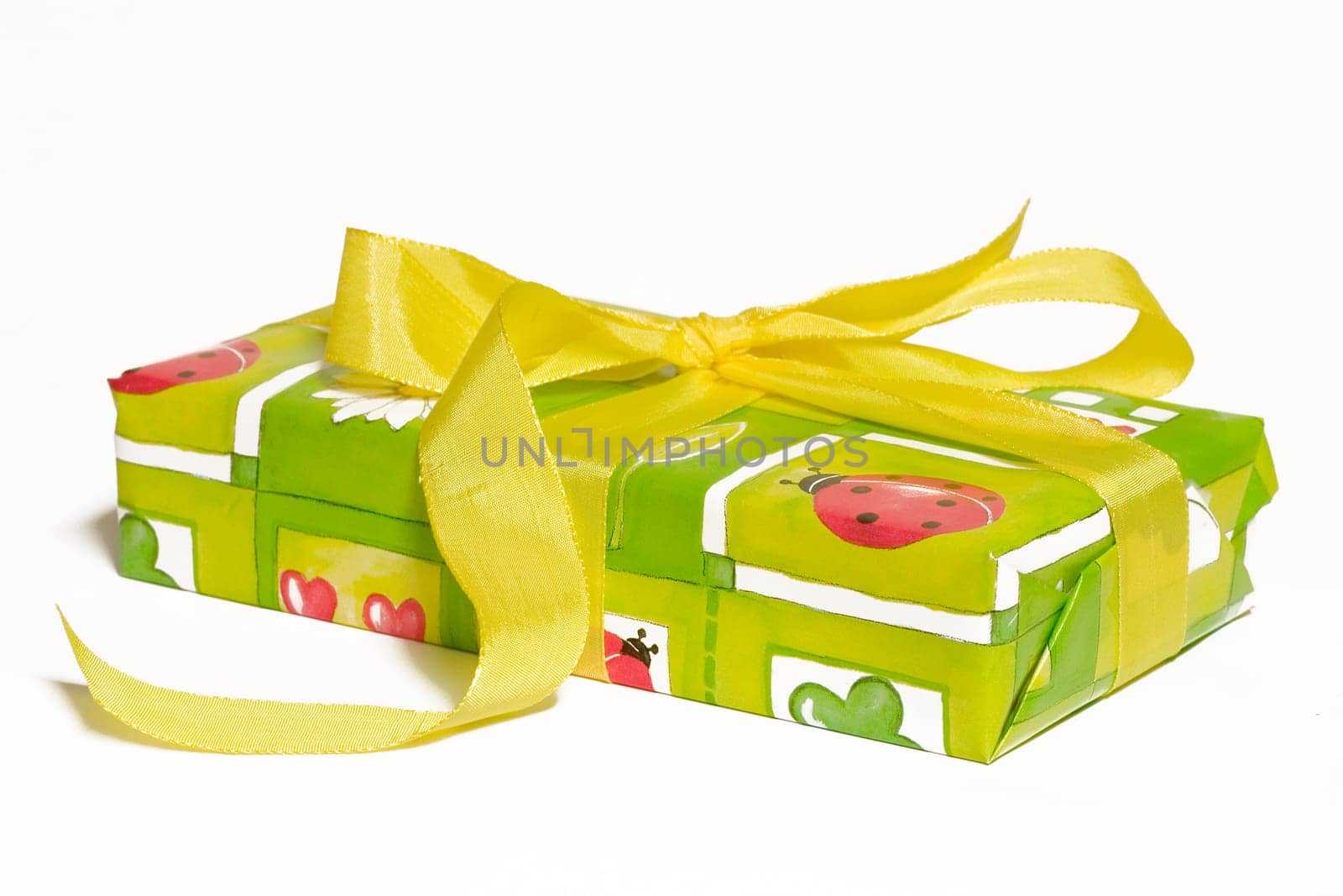 Gift wrapped with bow on white background