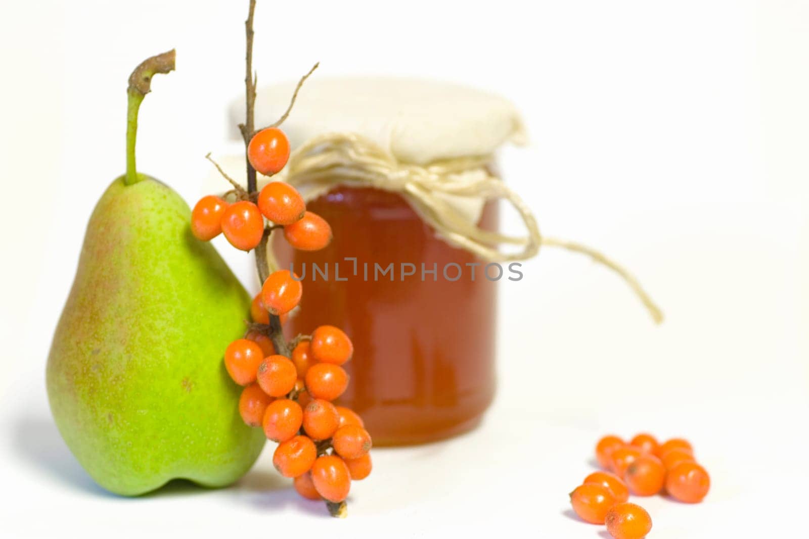 Jam jar against a white background