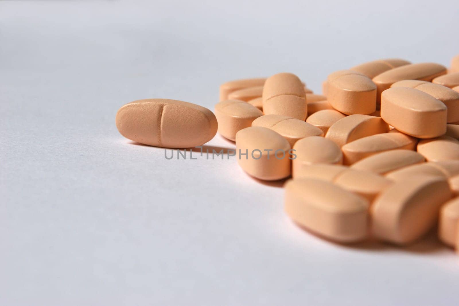 Tablets on a white background and a loner
