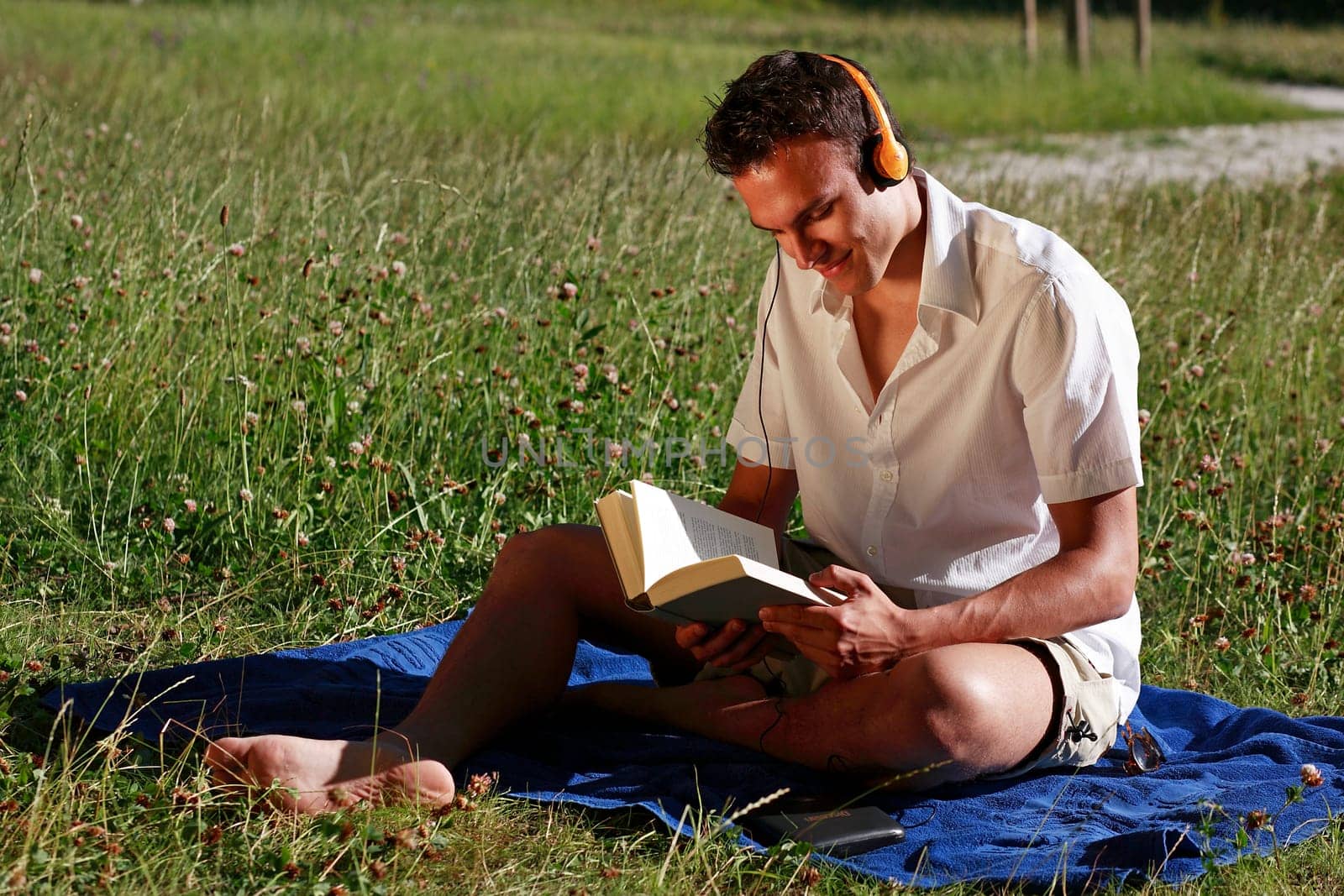 Student with book and headphones II
