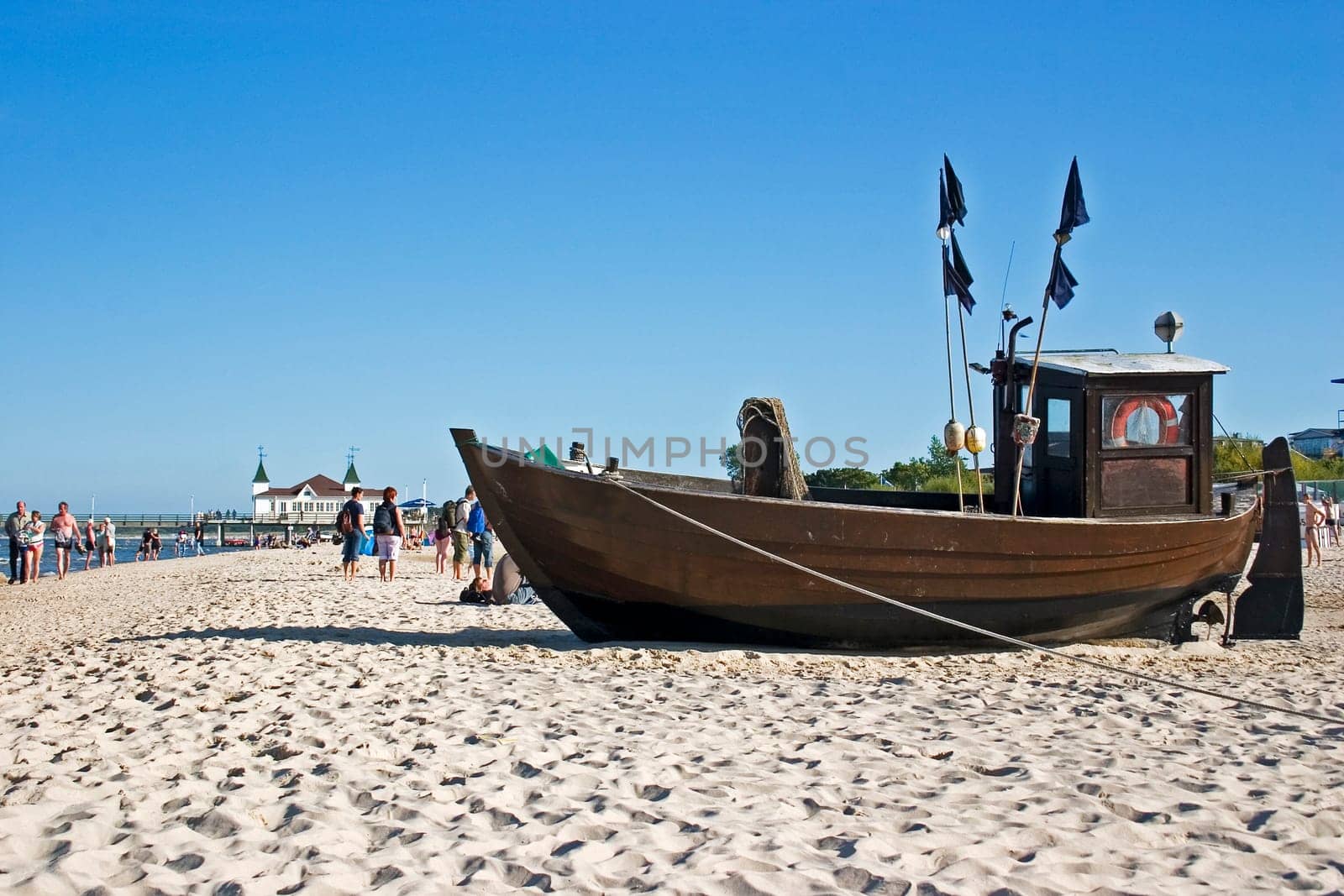 Island of Usedom,seaside resort of Ahlbeck with fishing boat and pier in the background