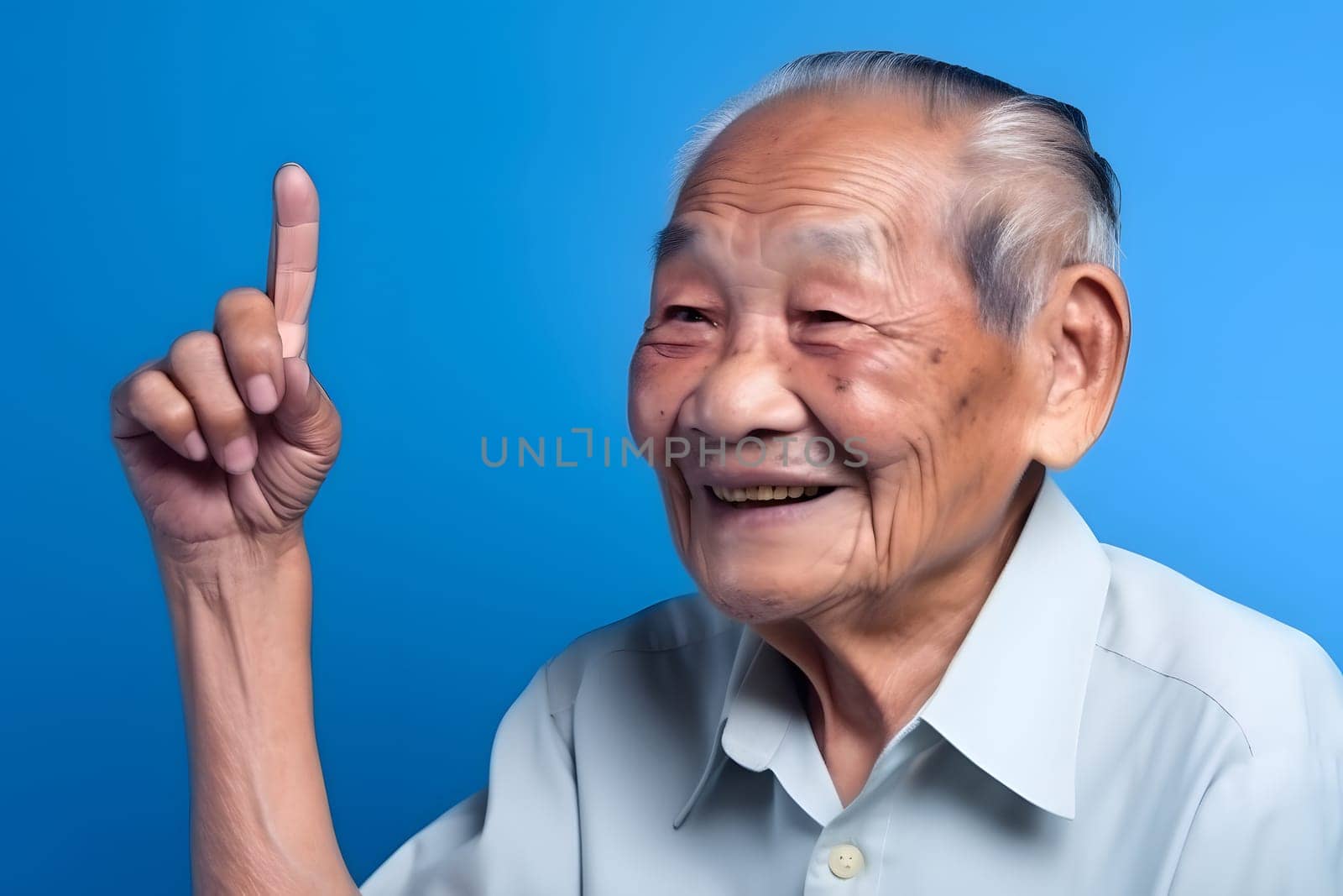 Asian grandfather looking and smiling with rised index finger on blue background. Neural network generated in May 2023. Not based on any actual person, scene or pattern.