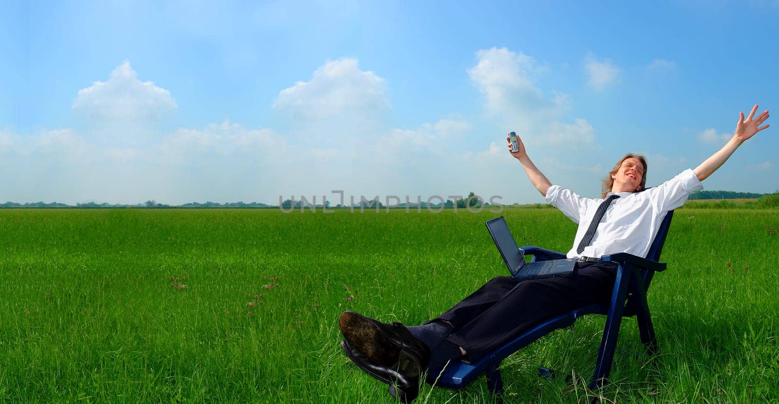 Businessman in deckchair