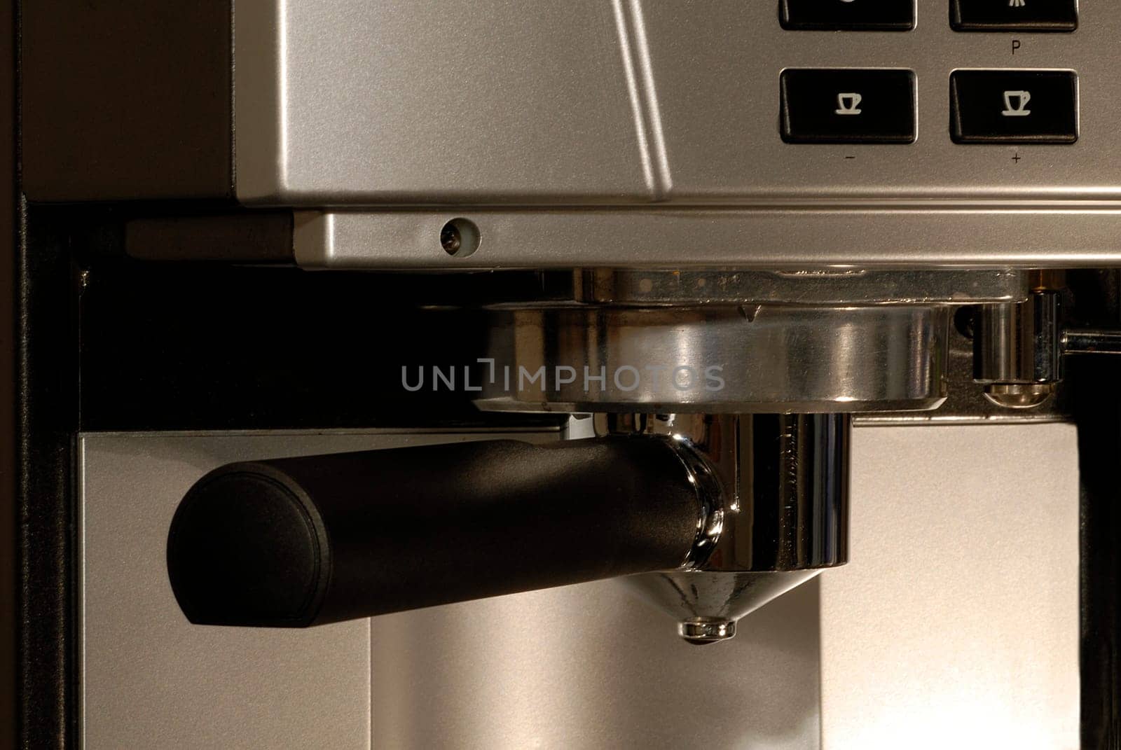For those who don't know the Nespresso system - one of the colored capsules is inserted into the flask shown. The hot water runs through the aluminum capsule under pressure and what comes out at the bottom is the coffee.