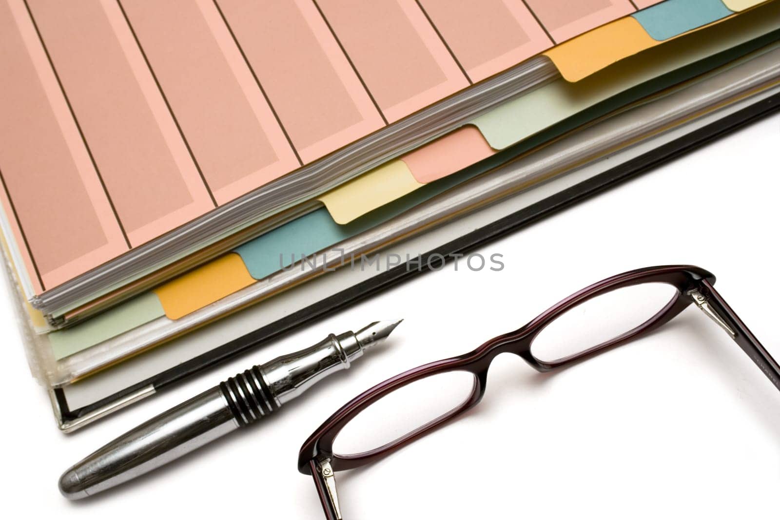 Folders,pen and glasses