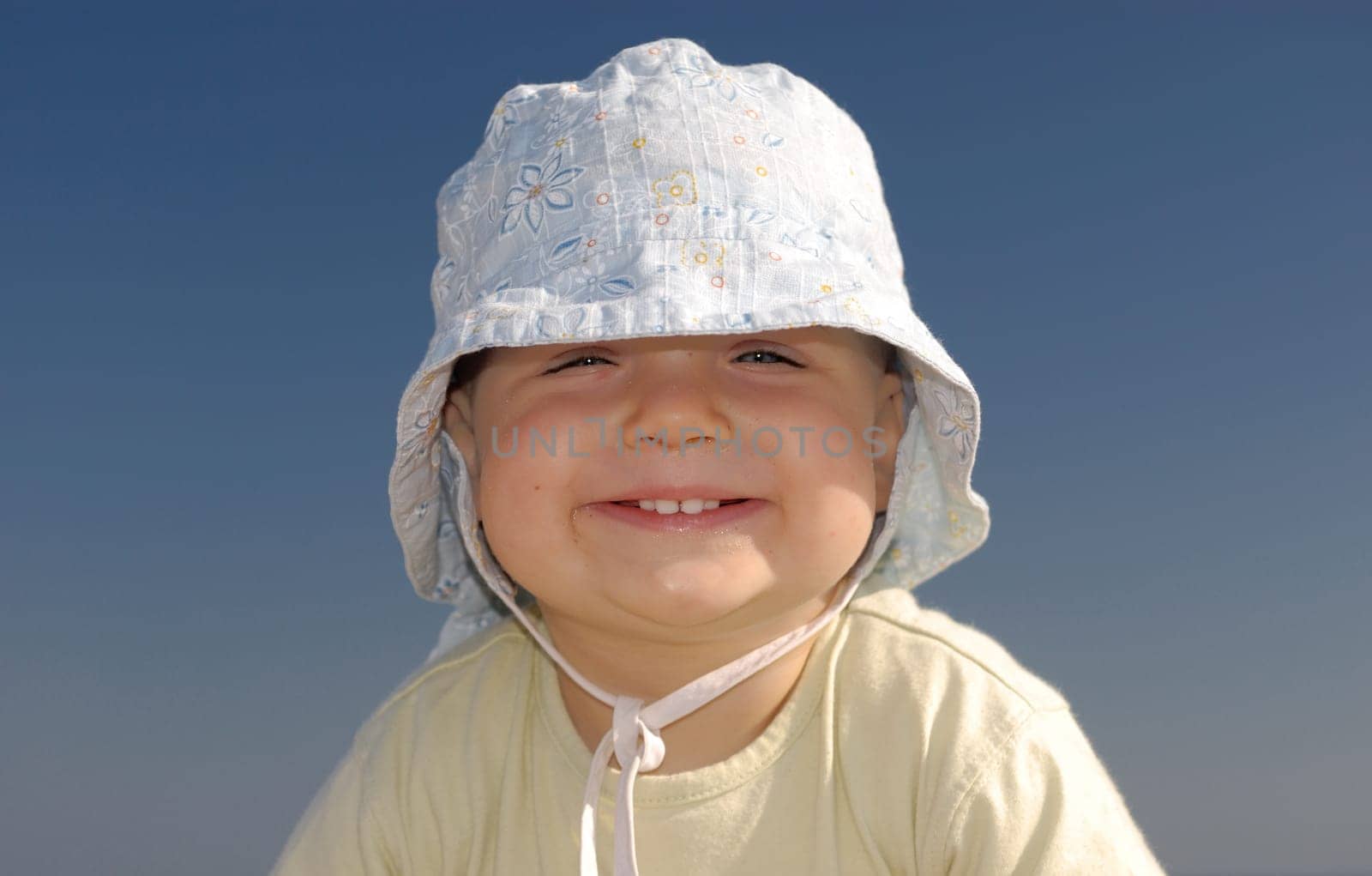 Children's portrait of a girl on the beach