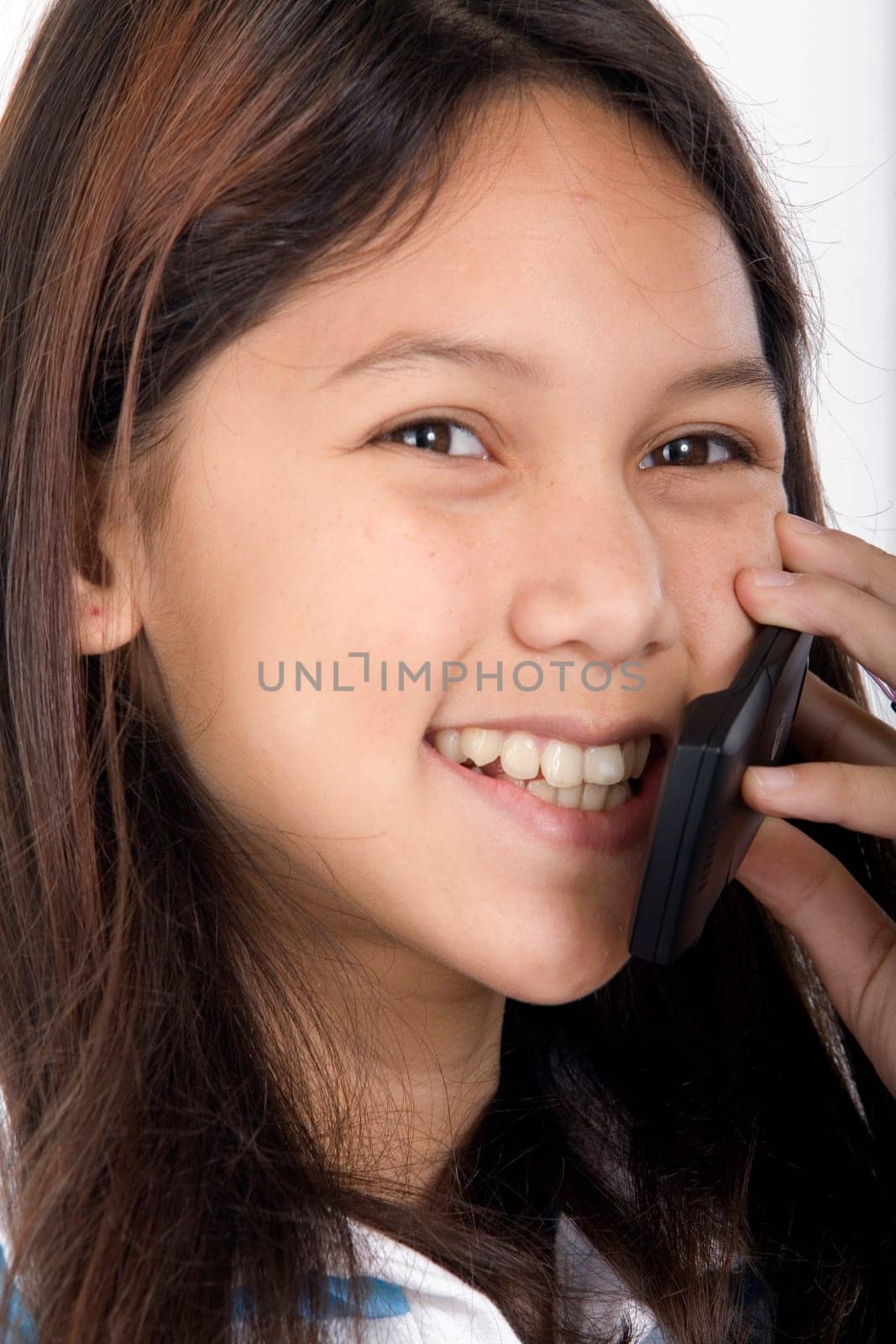Teenagers with mobile phones