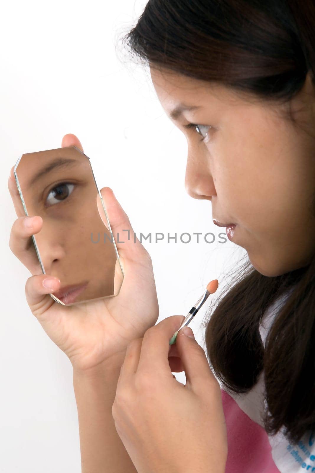 Girl putting on make-up