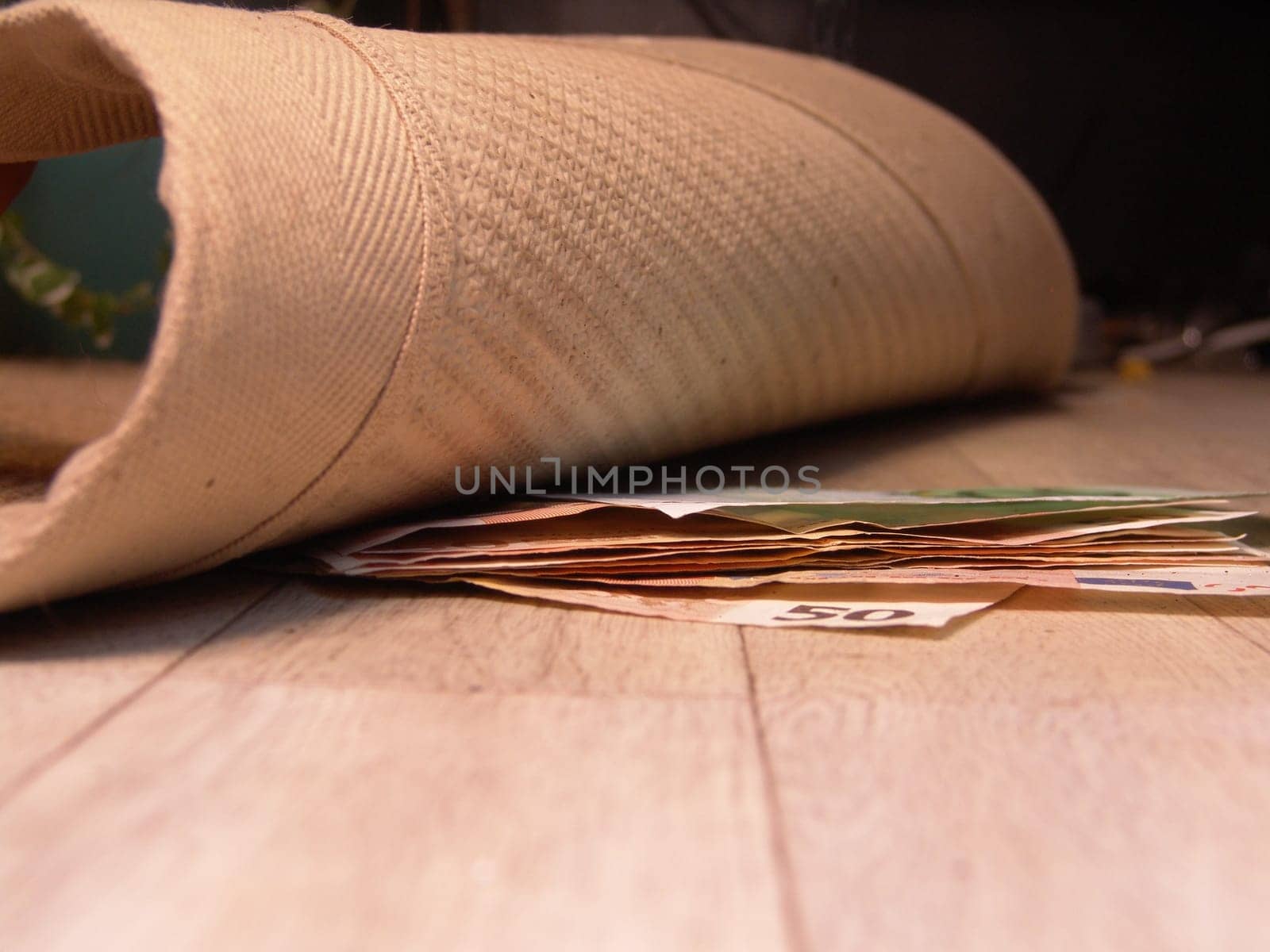 Money under carpet