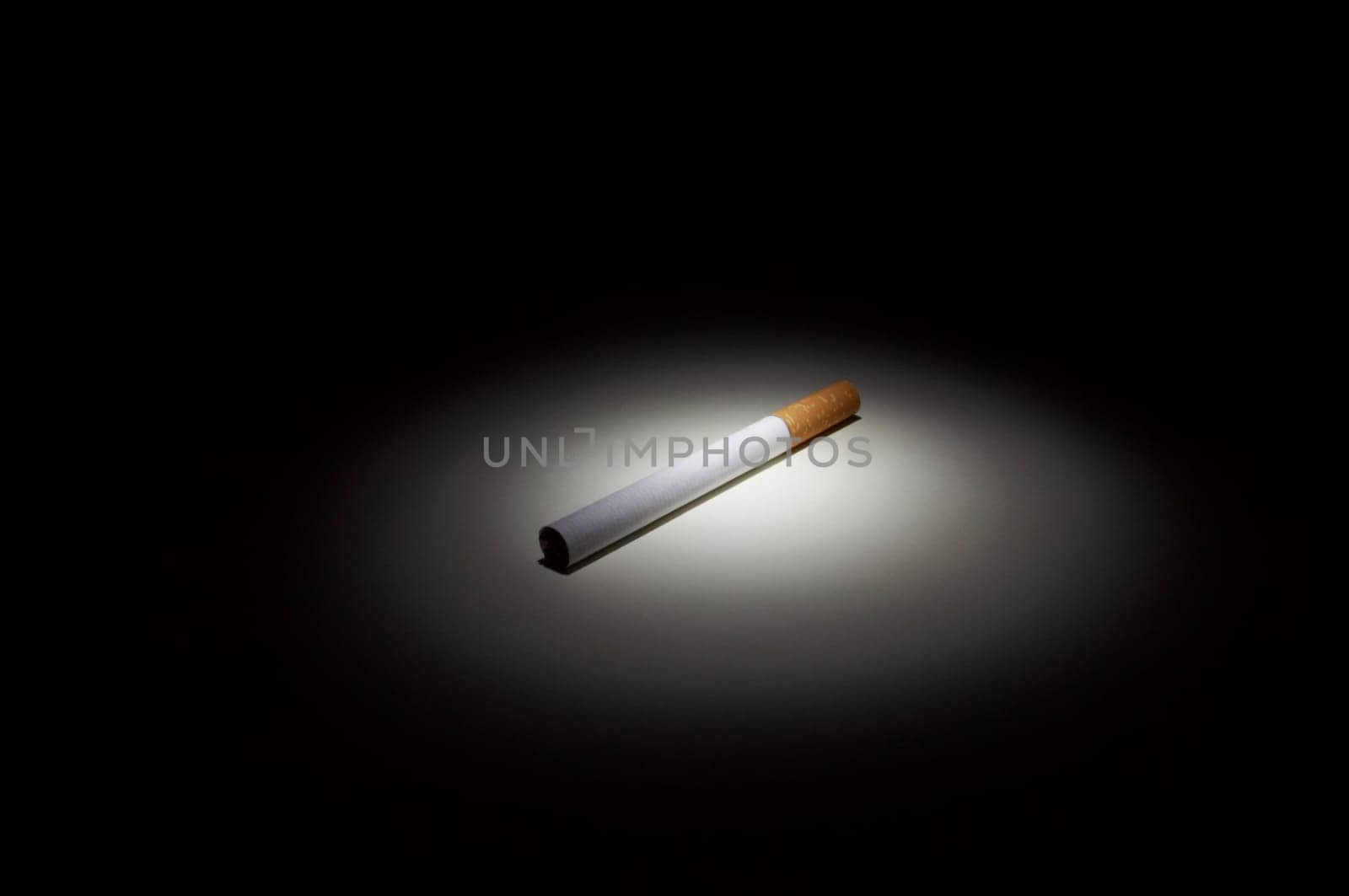 Cigarette in the spotlight